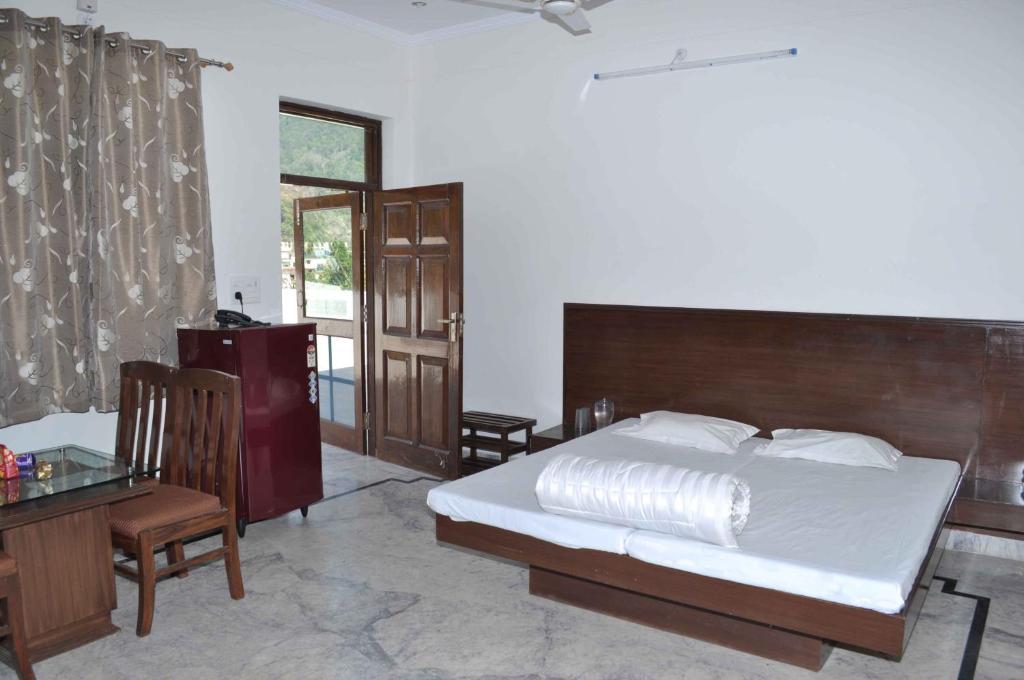 Shivanta Residency Hotel Risikés Szoba fotó