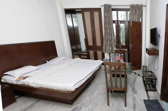 Shivanta Residency Hotel Risikés Szoba fotó